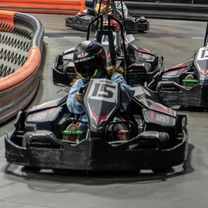 Racer speeds through indoor karting track at MB2 Raceway Sylmar